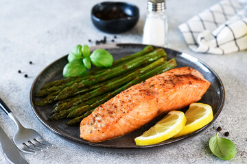 Baked salmon with asparagus for dinner