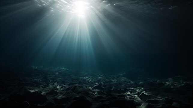 an underwater view of the ocean with sunlight coming through the water
