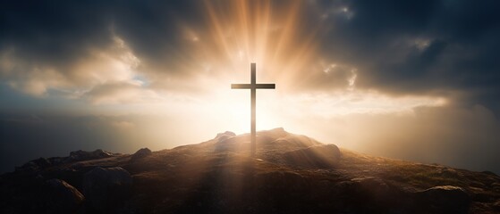 Holy cross symbolizing the death and resurrection of Jesus Christ with the sky over Golgotha Hill is shrouded in light and clouds. Apocalypse concept