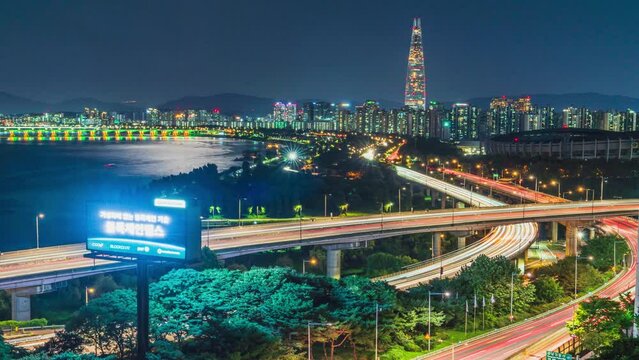Night time-lapse of Lotte World Tower and complex road traffic in Seoul, South Korea, September 29, 2023.