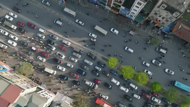 Top view of Hanoi cityscape at on Truong Chinh - Nga Tu So street with many vehicles on street.