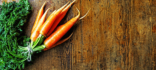 carrots on wooden background