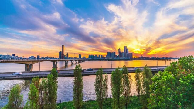 4k Time lapse Sunset of Seoul City Skyline at Han river in Seoul South Korea.
