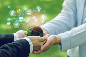 Hands business teamwork, world to Organization Sustainable development environmental. ESG icon...