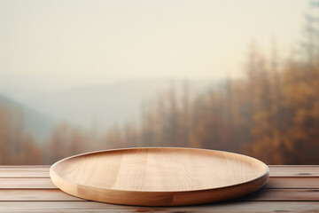 empty round wooden plate on a table, with a neutral and serene background.beige theme concept - obrazy, fototapety, plakaty
