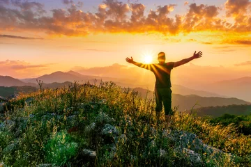 Foto op Plexiglas man doing hiking sport in mountains with anazing highland view © Yaroslav
