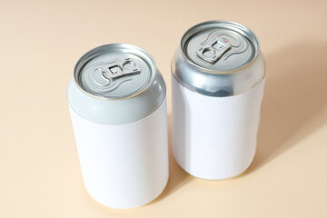 Tin cans for drinks on a light background