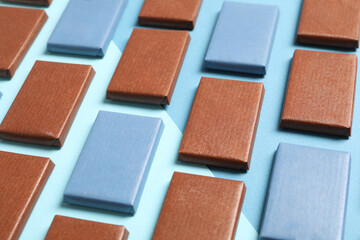 Blue and brown chocolate bars on a blue background