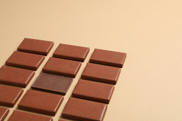 Brown chocolate bars on a light background