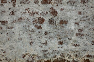 Old stone wall for background and texture.