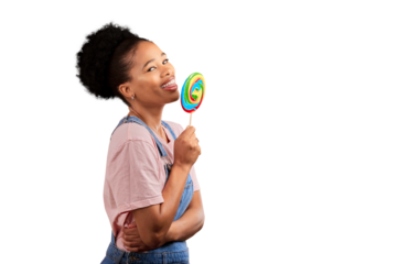 Portrait, smile and a black woman with a rainbow lollipop isolated on a transparent background. Candy, sugar and sweets with a happy young african person eating or licking a colorful snack on PNG