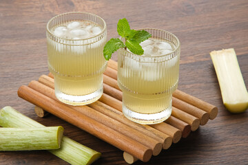 Fresh sugar cane juice (Es Tebu) in glass. Indonesian drink.

