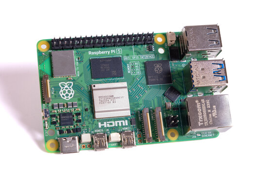 Raspberry Pi 5 isolated on white background. Single-board computer - SBC. Computer built on a single circuit board. RPi Model 5. Close up. Istanbul, Turkey - 16 November, 2023