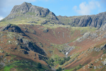 Fototapeta na wymiar Harrison Stickle and the Langdale Pikes above the valley of Great Langdale in the Lake District