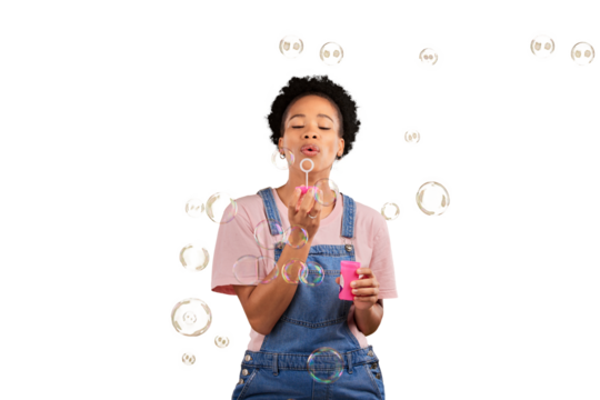 Black woman, blowing bubbles and fun while playful for birthday, happiness or party celebration. African female model person with liquid soap activity or hobby isolated by transparent png background