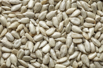 Sunflower seeds peeled in bulk, top view, close-up, full depth of field