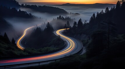 Car light trails on the road in the mountains. Long exposure photo.