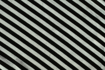 texture of black and white striped fabric.