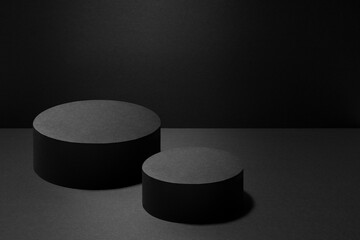 Abstract two black round podiums for cosmetic products with light beams, mockup on black background. Scene for presentation products, goods, advertising, design, display, showing in concert style.
