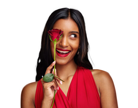 Excited woman, face and beauty with red rose for valentines day isolated on a transparent PNG background. Happy young Indian female person or model smile with flower in hand for romance or love