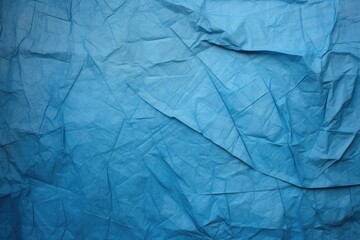 texture of a crumpled blueprint under diffused light