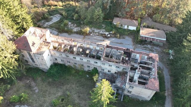 Ruined house. Ruined school building. Abandoned school in the forest