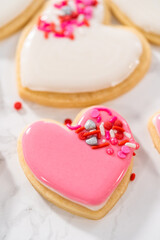 Heart-shaped sugar cookies with royal icing