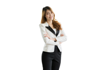 Portrait of Asian business woman wearing suit standing with crossed arms on white background