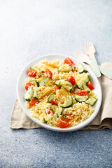 Couscous salad with grilled cheese and vegetables
