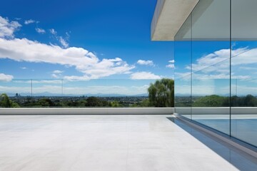 minimalistic concrete patio adorned with frameless glass balustrades