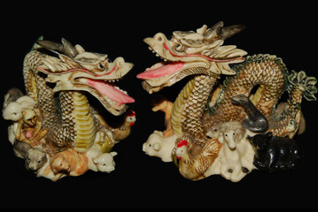 Dragon figurine. Zodiac sign. The dragon is surrounded by 11 animals, symbolizing the signs of the zodiac.