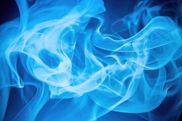Obraz premium captured smoke forming shapes against a blue background