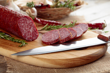 Salami on a cutting board.