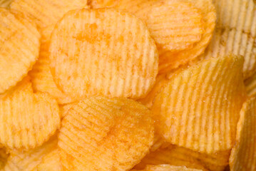 Crispy potato chips with salt, spices and herbs