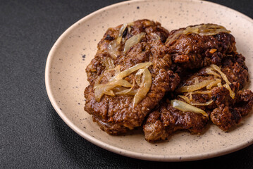 Delicious fried chicken or beef liver with salt, spices and herbs