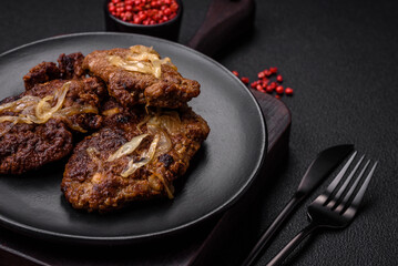 Delicious fried chicken or beef liver with salt, spices and herbs