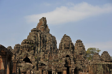 The Bayon is a richly decorated Khmer temple related to Buddhism at Angkor in Cambodia. Built in the late 12th or early 13th century.