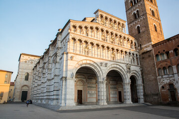 Facade of Lucca Cathedral. It is a Roman Catholic cathedral dedicated to Saint Martin of Tours in...