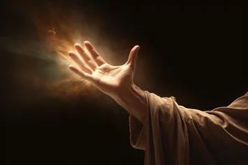 Foto auf Alu-Dibond Symbolic Image of Jesus' Hand Reaching Out Against Darkness © Kristian