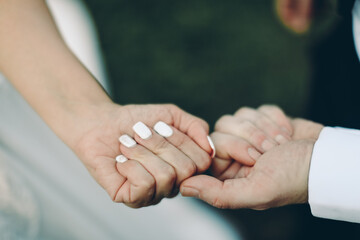 close up of hands holding each other