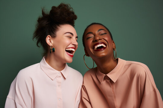 Boundless Laughter: Interracial Best Friends Share Joyful Moments in Studio