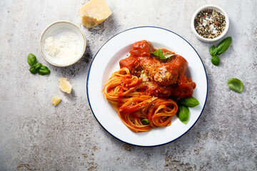 Spaghetti with meatballs and Parmesan cheese