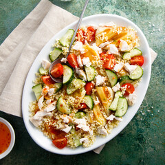 Couscous salad with grilled cheese and vegetables