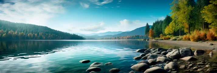 Fotobehang Calm and reflective lakeshores with serene waters and scenic beauty. © Maximusdn