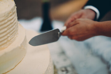 person slicing bread