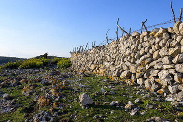 Fototapeta premium Old stone wall on the island Cres