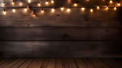 Christmas dark wooden background on wall with glowing garlands and place for text, dark parquet floor. Minimalism style. Concept of Christmas and New Year holidays. Copy space.