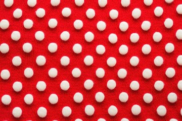close-up of polka dot pattern on a wool sweater