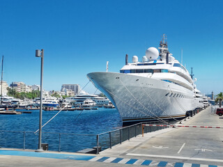 Snow-white yacht in the Spanish port of Barcelona