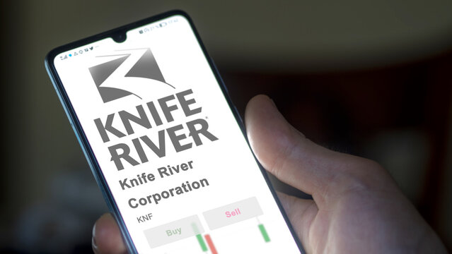 November 15th 2023. The trading page of Knife River Corporation on a stock exchange, a shareholder analyzing $KNF, , on a device.